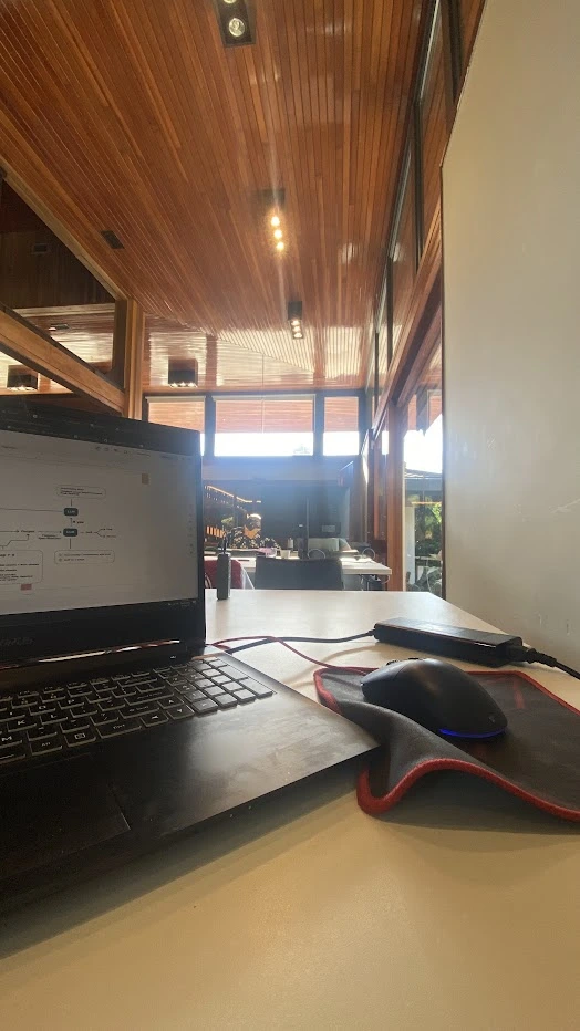 Laptop and workspace inside the Pi School campus